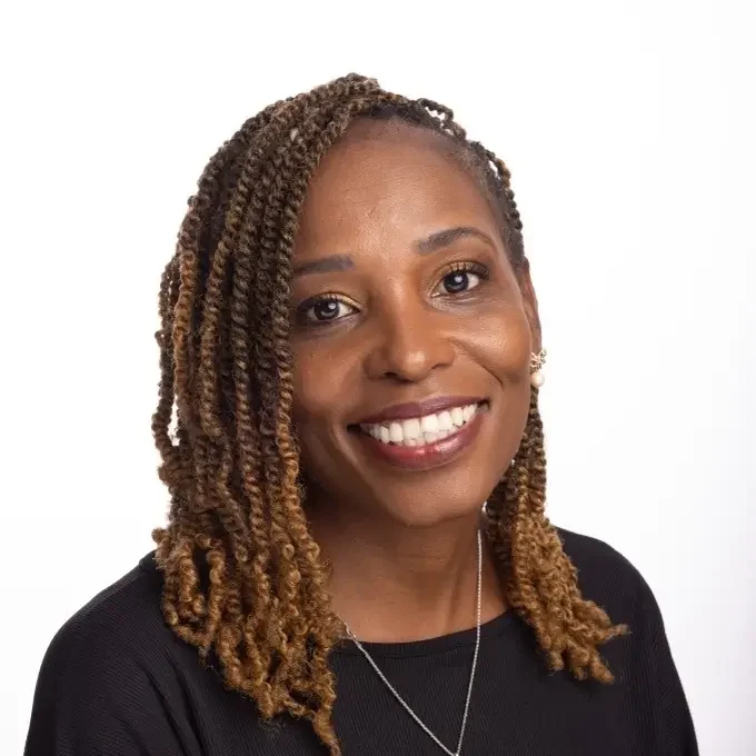 Cornelia James Parent Sawgrass Adventist School - Adult black woman smiling at the camera