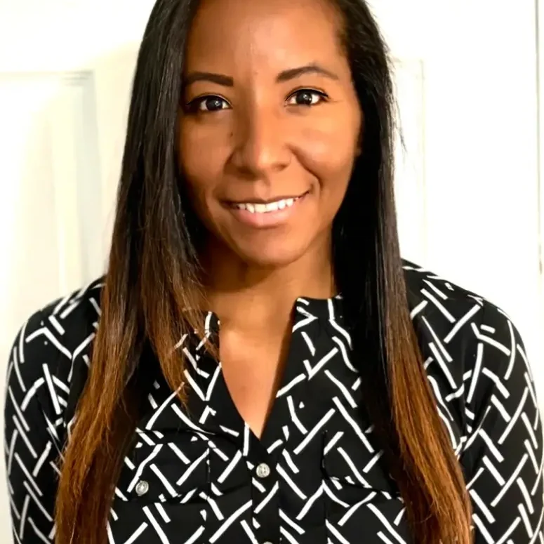 Nathalia Knott Teacher Sawgrass Adventist School - female teacher smiling at the camera.